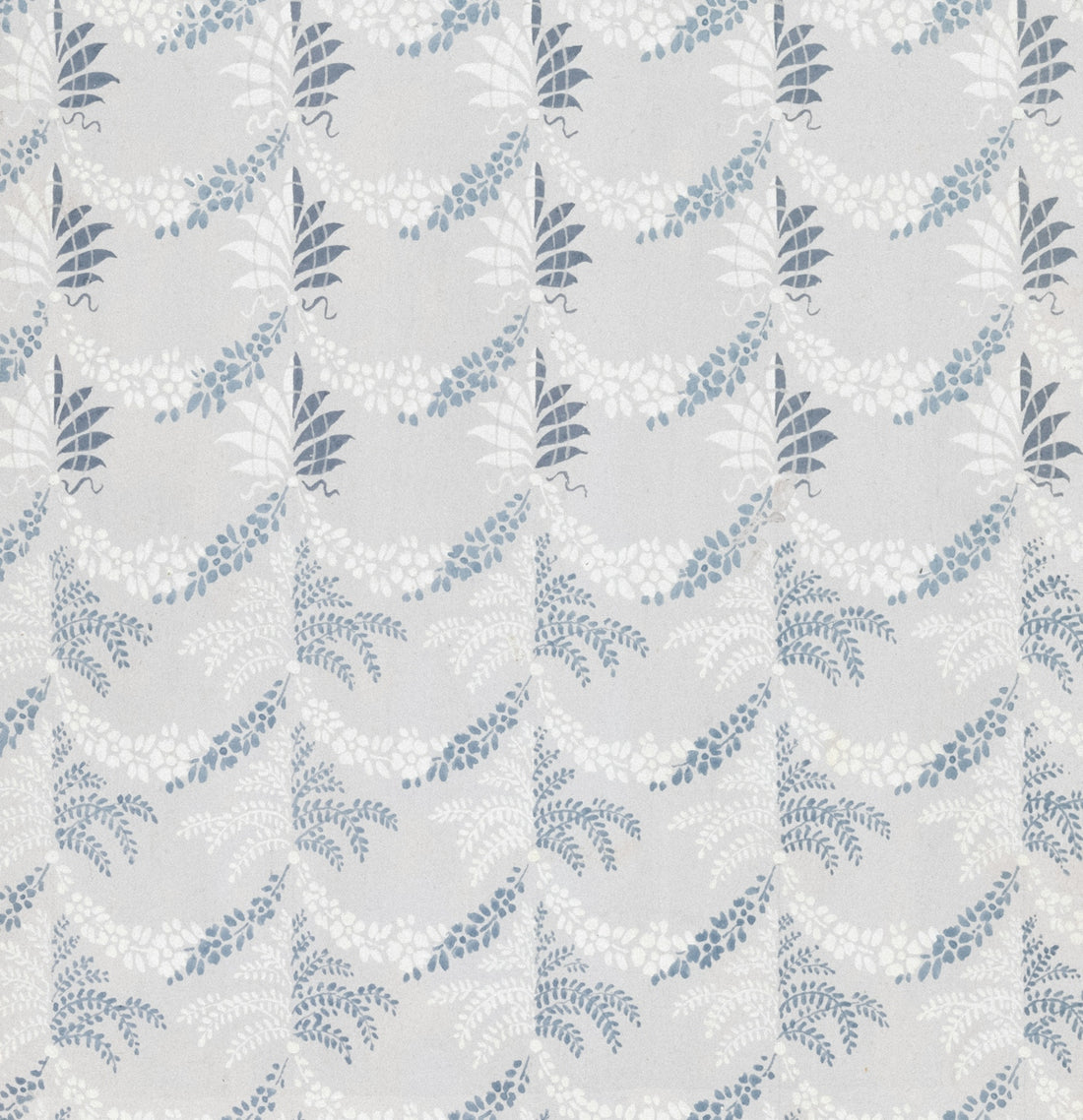 Abstract pattern of white and blue foliage on light background.