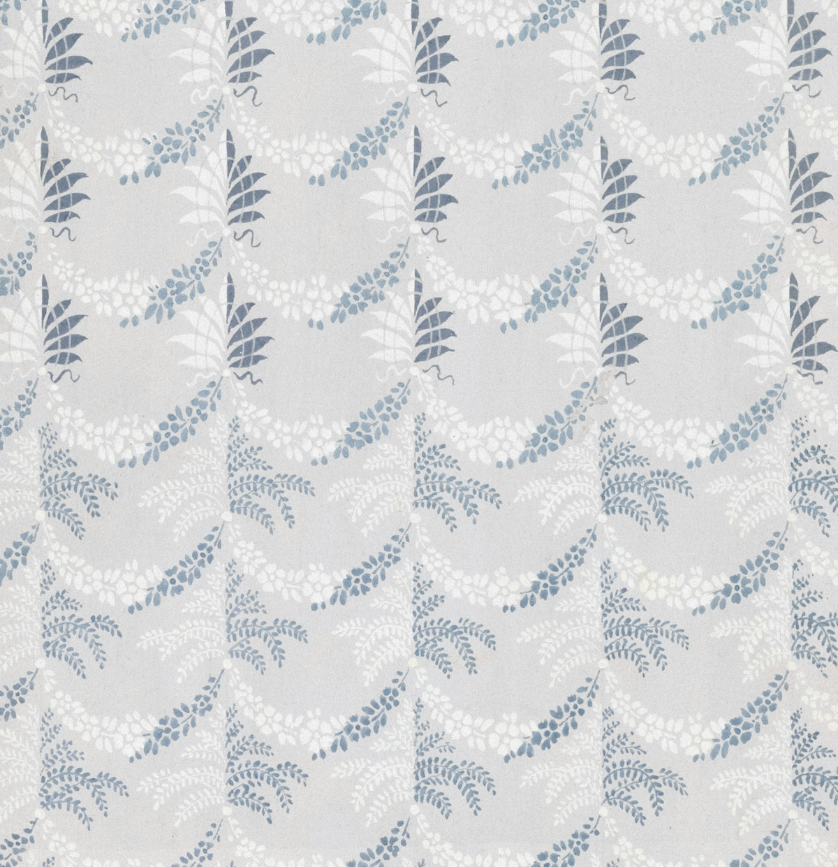 Abstract pattern of white and blue foliage on light background.